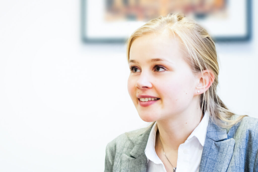 a women in a corporate meeting