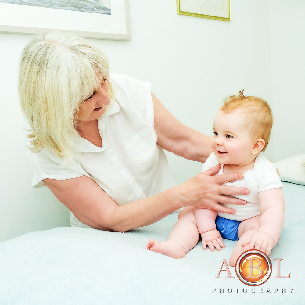 crania-sacral therapist treating a baby